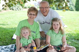 Carol Anne and husband Terry pictured with Granddaugthers